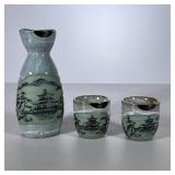 JAPANESE SAKE SET | In box ceramic Japanese sake set with pitcher & 2 glasses. - h. 3 x w. 6.5 x l. 