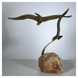 Brass Seagulls | A brass statue of two birds in flight mounted on piece of quartz. - h. 17 x w. 17 x