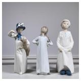 (3pc) Lladro Figures | Lladro porcelain figurines, including a young lady with bonnet and cat, lady 