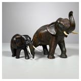 (2pc) Elephants With Tusks | Including a bronze elephant figure and a smaller carved wood elephant. 