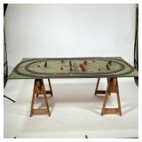 Model Train Display Table | Painted top with two sets of tracks, accompanied by a two sawhorse base.