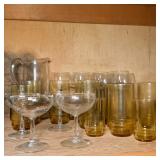 (23pc) MIXED GLASSWARE | Mixed lot of glassware including: 4 champagne glasses, 10 yellow glasses, 8