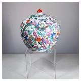 CHINESE LIDDED JAR | Lidded Chinese jar decorated with various figures and scenes in bright colors, 