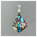 SILVER SPECIMEN STONE PENDANT | Sterling silver wirework pendant mounting a triangular specimen ston