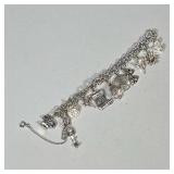 MONET CHARM BRACELET | Monet mixed metal charm bracelet with Sterling Silver charms including; rose,