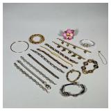 (16pc) GOLD & SILVER TONED BRACELETS | Large lot of gold and silver toned costume bracelets includin