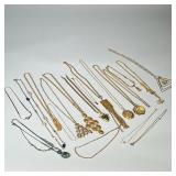 GOLD TONE COSTUME NECKLACES | Large lot of mixed gold-tone costume jewelry necklaces including; Swar