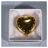 HEART COMPACT | Heart-shaped gold-tone mirror compact. Dimensions: w. 2.25 x l. 2.5 in