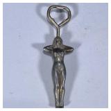 LADY BOTTLE OPENER | Cast metal woman form bottle opener. Dimensions: w. 2 x l. 6.5 in