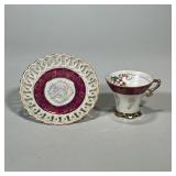 Invicta Cup & Saucer | With gilt highlights, the saucer with reticulated rim, marked on the bottom "