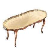 BRASS TRAY TOP TABLE | A large brass tray with nail handles on a fitted low table h. 20 x w. 17.5 x 