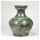 CHINESE ANTIQUE GREEN GLAZED VASE | Likely Han dynasty; A bulbous pottery vase with deep green glaze