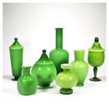 "(7pc) OTTO BRAUER GREEN GLASS GROUP | Comprising: four open vases and three lidded jars h. 17.25 x 