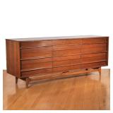 "YOUNG FURNITURE MID-CENTURY CURVED TRIPLE DRESSER | Triple dresser having nine drawers with concave