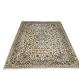 "SCULPTED CARPET | Cream field with a central pale blue medallion h. 163 x w. 116 in."