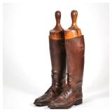 "LEATHER RIDING BOOTS & FORMS | A pair of women
