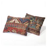"(2pc) RUG UPHOLSTERED PILLOWS | geometric rug fragments, velvet backs h. 14 x l. 19 in. (Largest)"
