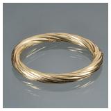 UNOARRE TWISTED ROPE FORM 18K GOLD HARD BRACELET | 18K Yellow Gold twisted bracelet, marked "750" an