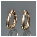 14K GOLD HOOP EARRINGS | Pair of 14K gold teardrop hoop form earclip earrings, marked "14K" on back 