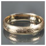 ENGRAVED 14K GOLD HINGED HARD BRACELET | 14K yellow gold bracelet with engraved floral pattern, mark