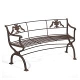 REGENCY CAST IRON GARDEN BENCH | Cast iron outdoor bench with a curved seat and x-form supports, urn