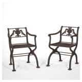 PAIR REGENCY CAST IRON GARDEN ARMCHAIRS | rod seats, x-form supports, urn splats