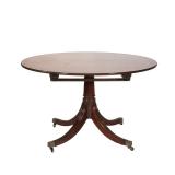 "REGENCY STYLE PEDESTAL BREAKFAST TABLE | Round top table with inlaid wood border, over four reeded 