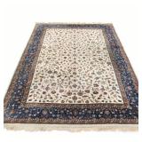 CREAM & BLUE SCULPTED CARPET | having a cream field with overall pattern, blue border - w. 116 x l. 