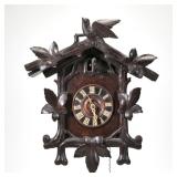 "BLACK FOREST CUCKOO CLOCK | late 19th/ early 20th century, crested by a bird with maple leaves, wit