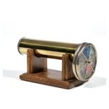 "JANICE CHESNIK KALEIDOSCOPE | Handmade brass kaleidoscope, signed and 1986, on a conforming wood st