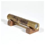 "STEPHEN AUGER KALEIDOSCOPE | Textured brass cylinder kaleidoscope, signed with artist