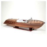 ITALIAN RIVA SCALE MODEL WOODEN BOAT | h. 8 x w. 10.5 x l. 34 in.