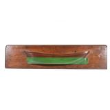 "HALF HULL MODEL SHIP, HILFIGER COLLECTION | nicely figured wood with green paint h. 10.25 x w. 44.7