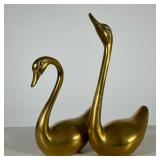 Pair Mid-century Brass Swans | A set of two mid-century modern brass swans. - h. 12 in (largest)
