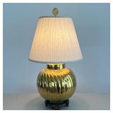 Hammered Brass Table Lamp | Swirled and hammered polished brass lamp mounted on a wooden stand. - h.