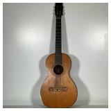 6-String Acoustic Guitar | Older 6-string acoustic guitar.