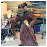 HALLOWEEN WITCH STATUE | Hollow plastic witch statue for Halloween. Dimensions: h. 64 x w. 26 x d. 6