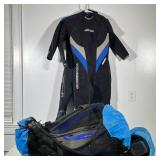 (4pc) Scuba Diving Gear | Two mesh bags of scuba equipment. Henderson Dive Wear suits sized 10 and s