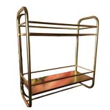 Brushed Metal Wall Shelf | Gold tone, two shelves with lower towel rack. Dimensions: h. 21.75 x w. 2