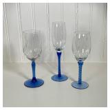 (3pc) Blue Stemmed Flutes | Three individual champagne flutes, two with twisted stems. Dimensions: h