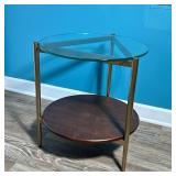 Art Deco Style Side Table | Round glass top over a brass triangular frame with a wood medial shelf D