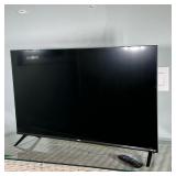 TCL Roku Smart TV | TCL Model 32S359. On footed stand comes with remote. Dimensions: h. 18 x w. 28 x