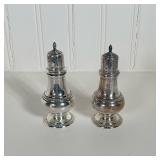 Sterling Salt And Pepper Shakers | Marked on bottom. Dimensions: h. 5.5 x w. 2.5 in.