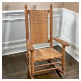 CARVED WOOD ROCKER | With rush seat & back - h. 43 x w. 27.5 x d. 34 in.