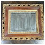 WOOD & GILT MIRROR | Beveled glass mirror in carved wood & gilt frame - h. 27.5 x w. 31 in.