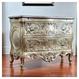 SILVERED ITALIAN BOMBE CHEST | A showstopper - silver finished chest decorated with an overall viney