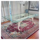 BESPOKE ETCHED GLASS DINING TABLE | Glass top with etched scroll pattern raised on a blue & white pa