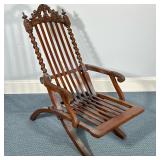 Antique Carved Wood Deck Chair | Antique carved wood folding deck chair with twisting spindle carved