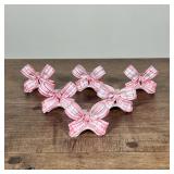 (6pc) PORCELAIN PLACE CARD HOLDERS | Glazed porcelain place card holders in the form of a bow. Dimen