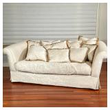 Sofa | Cream colored damask sofa. One full cushion with zipper. Pillows included. Flat apron. - h. 3